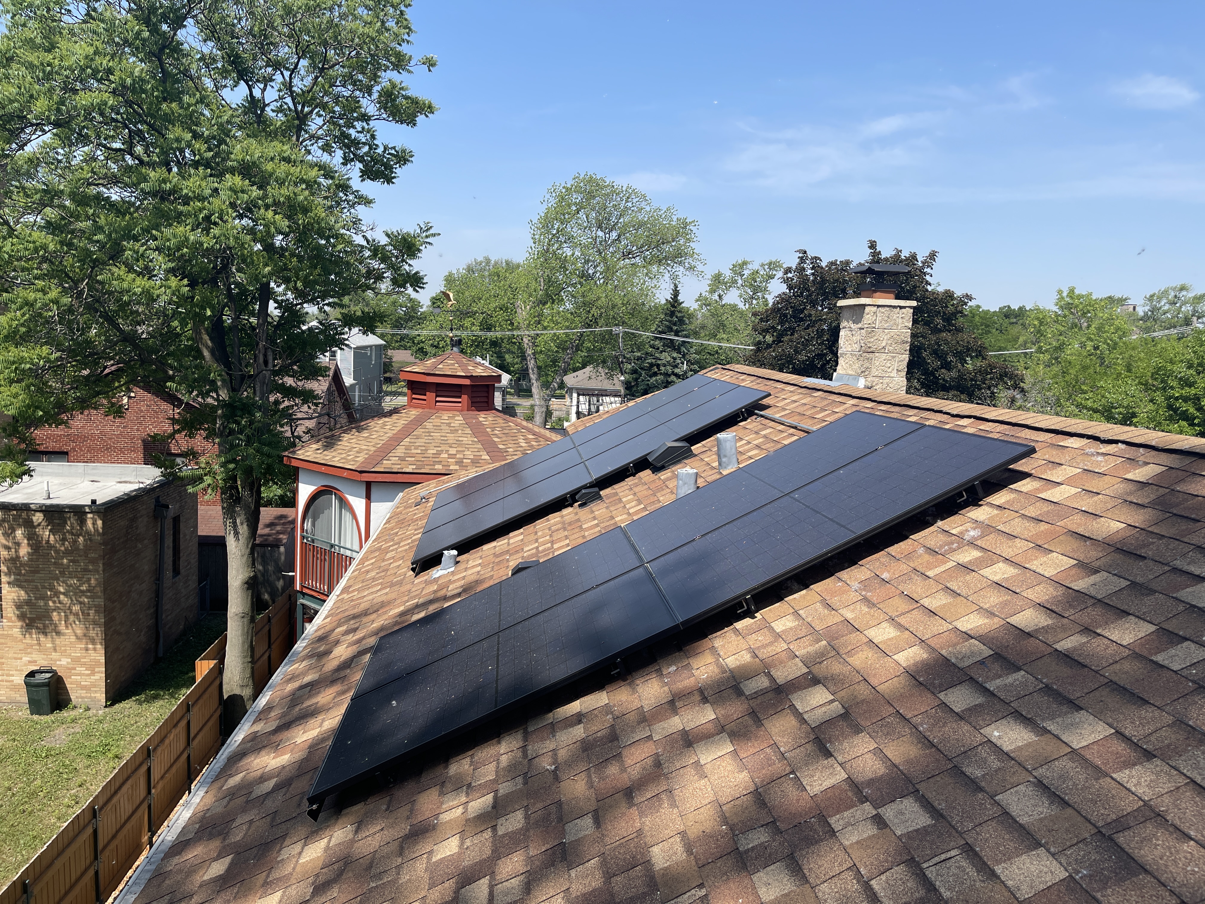 Braven Solar installer carrying a residential solar panel